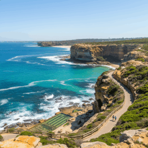 A vertical, panoramic photo of the Bondi to Coogee path showing the dramatic cliffs and clear blue wate